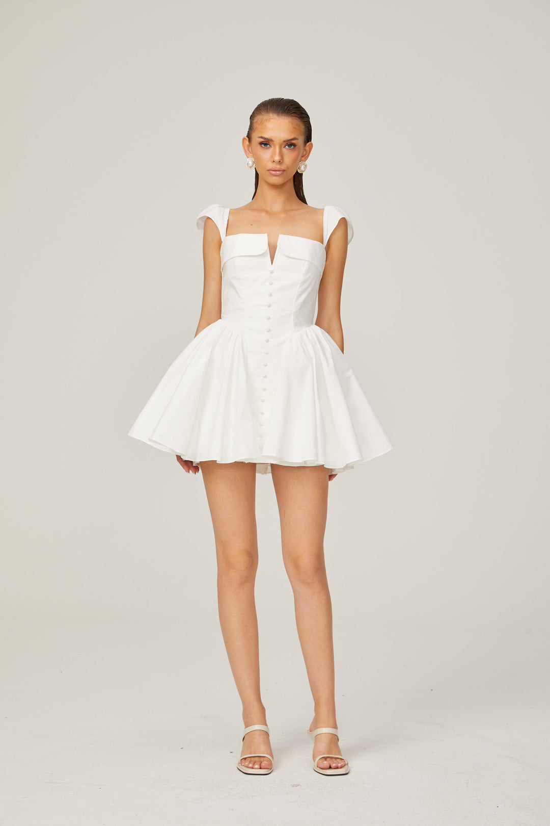 Julie white folded-neck bonded sleeveless mini dress - Celestia Couture