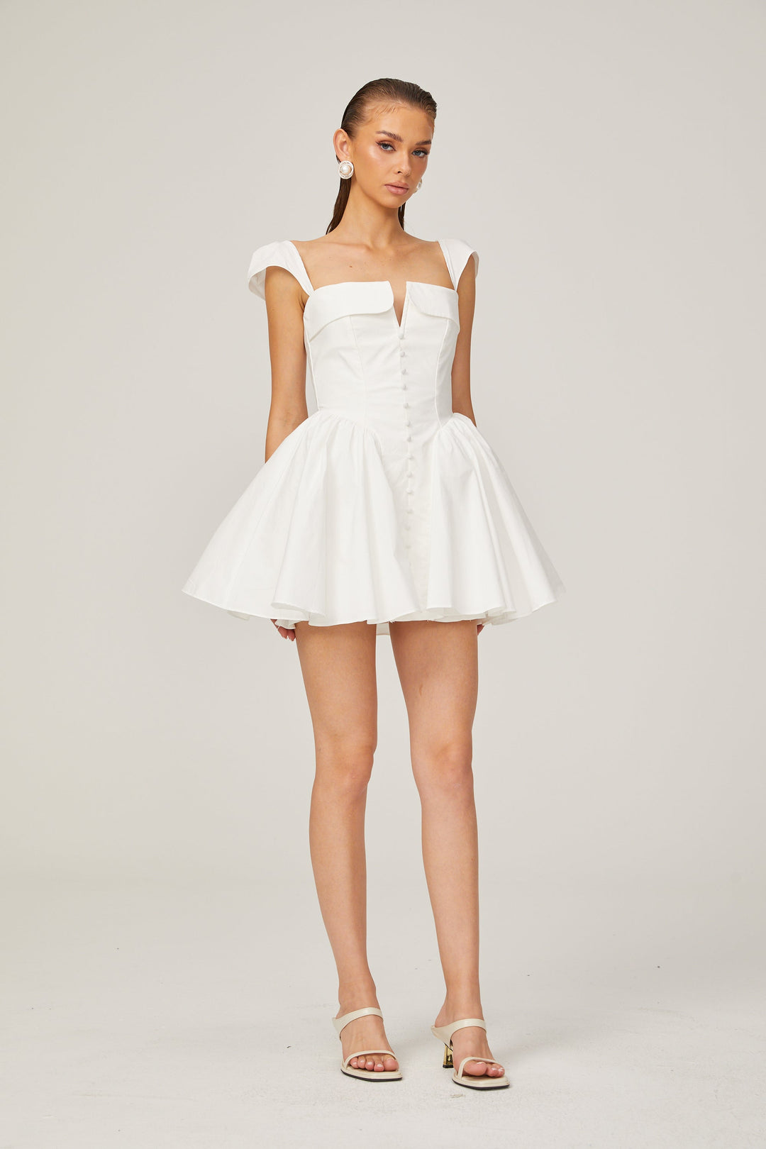 Julie white folded-neck bonded sleeveless mini dress - Celestia Couture