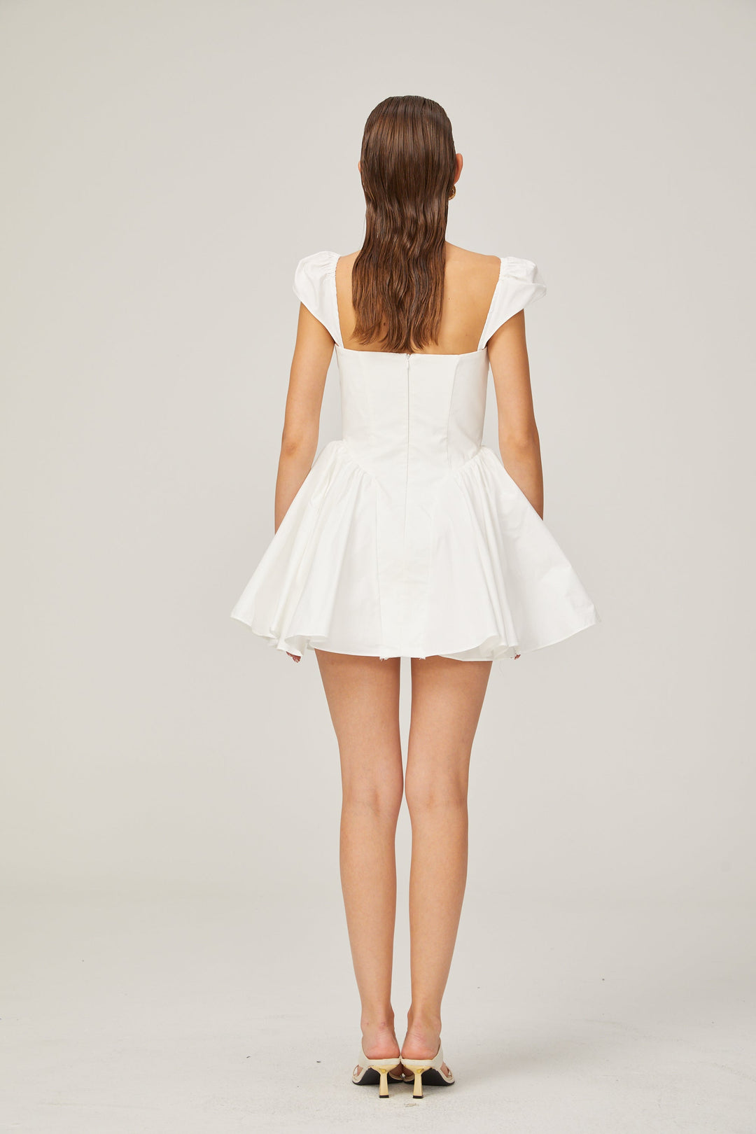 Julie white folded-neck bonded sleeveless mini dress - Celestia Couture