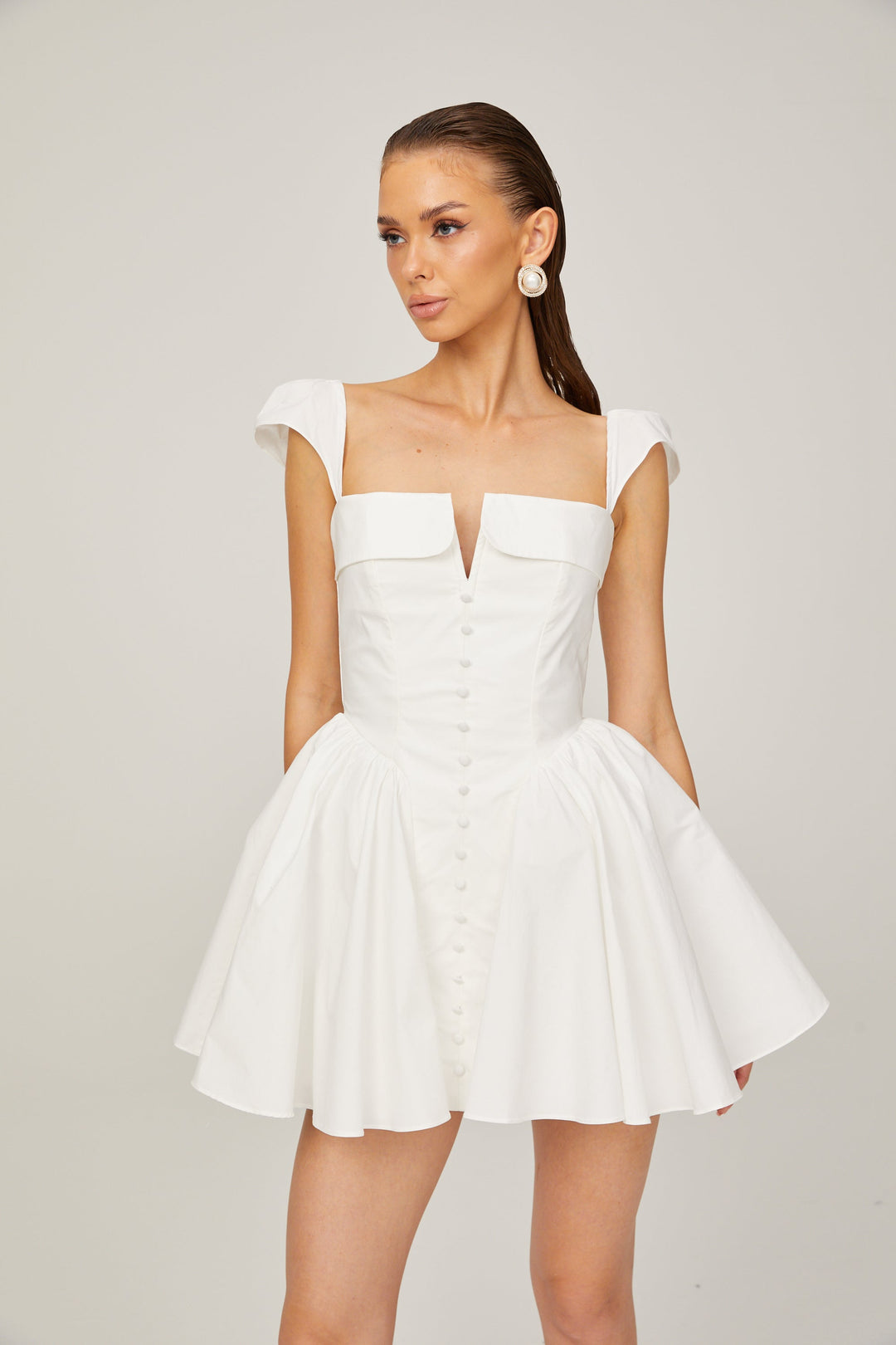 Julie white folded-neck bonded sleeveless mini dress - Celestia Couture