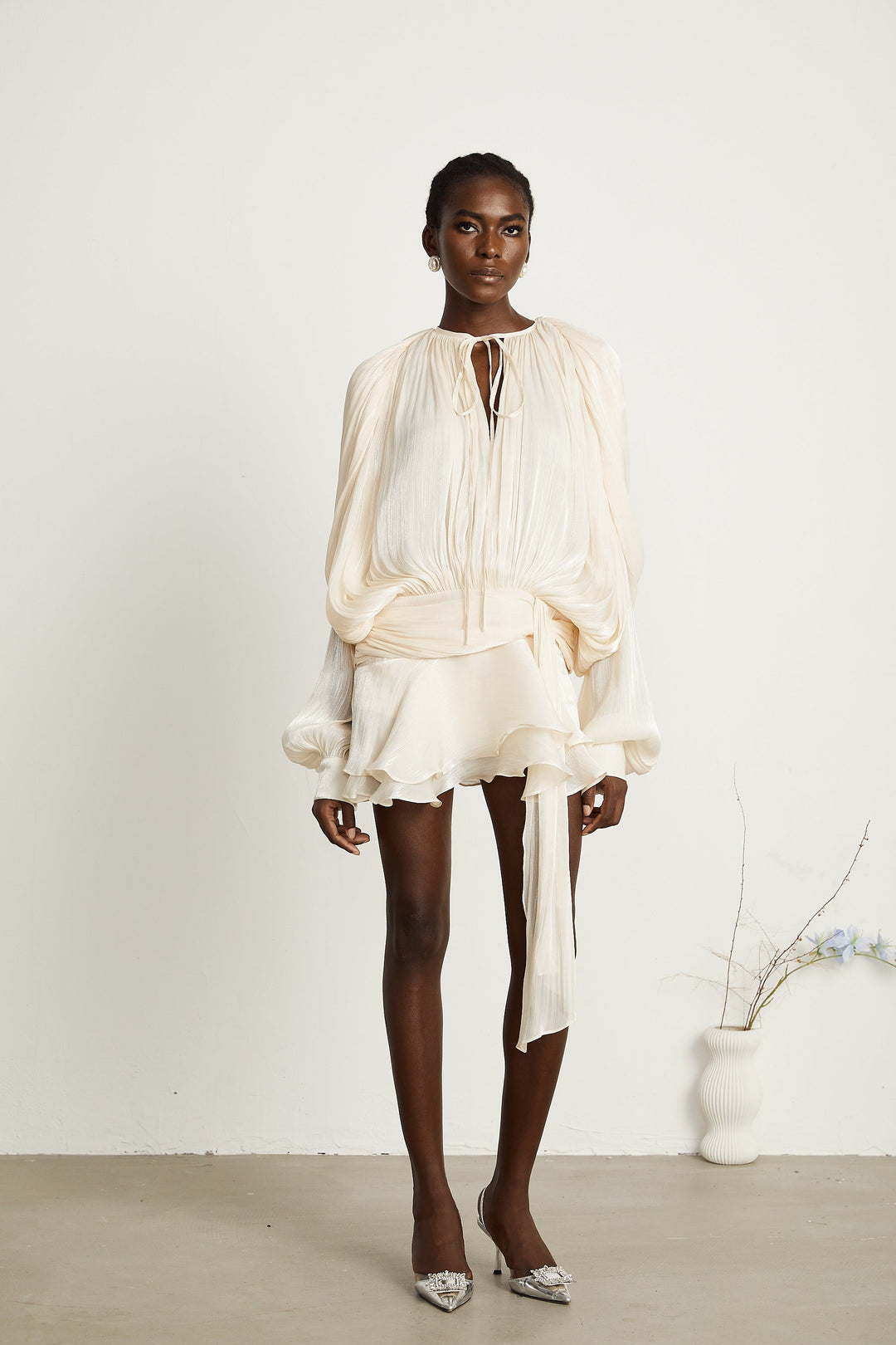 Eugénie fully-pleated ruffled mini dress in Neutrals - Celestia Couture