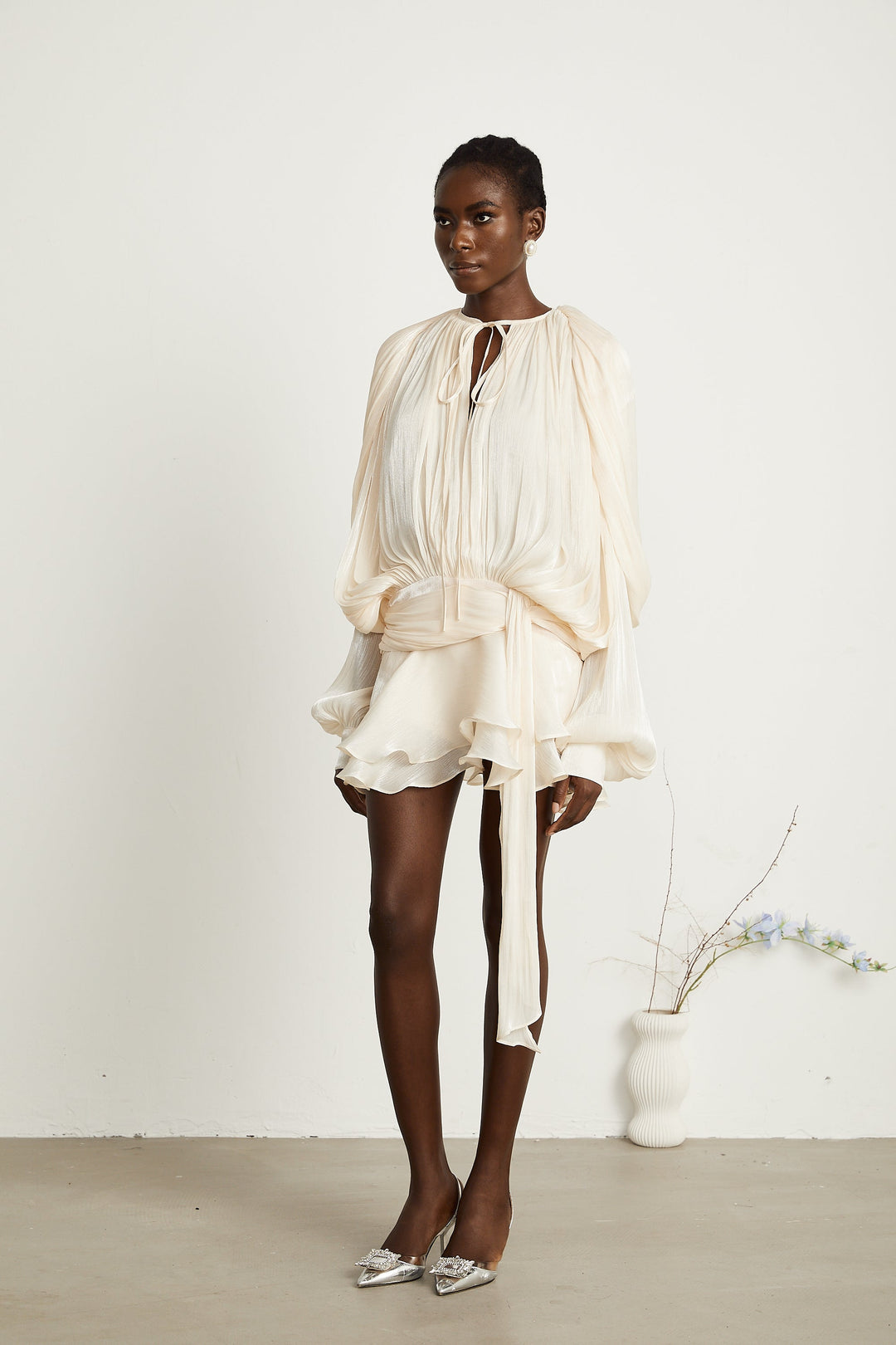 Eugénie fully-pleated ruffled mini dress in Neutrals - Celestia Couture