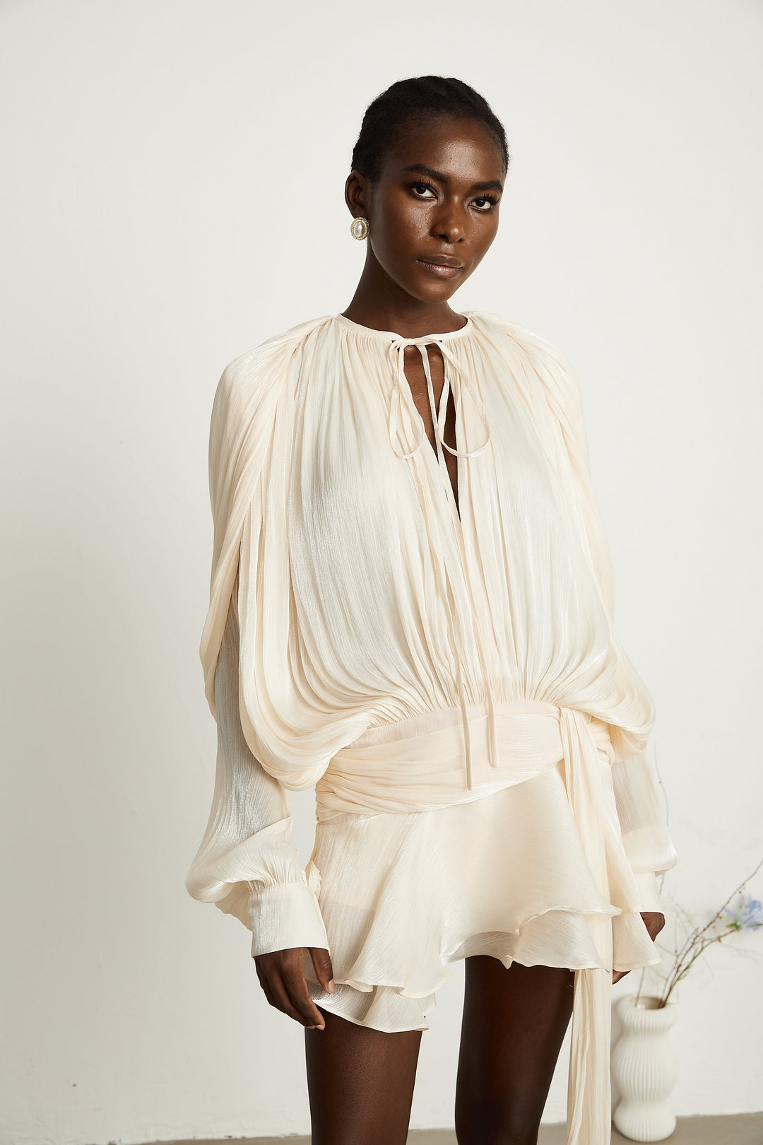 Eugénie fully-pleated ruffled mini dress in Neutrals - Celestia Couture