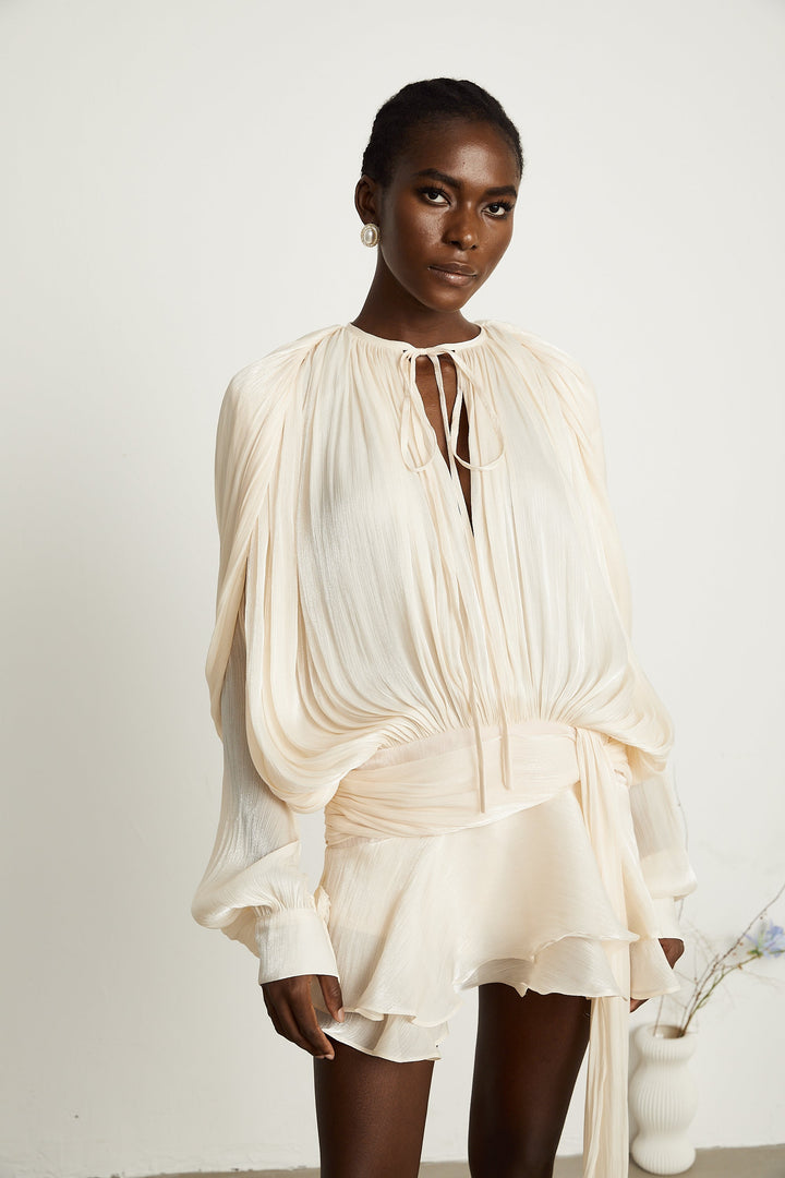 Eugénie fully-pleated ruffled mini dress in Neutrals - Celestia Couture