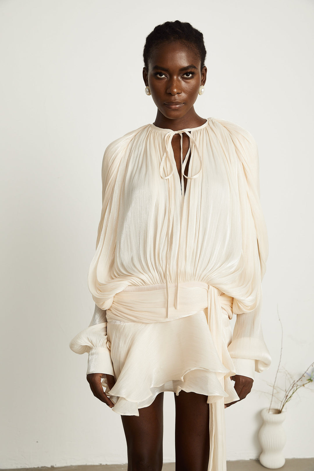 Eugénie fully-pleated ruffled mini dress in Neutrals - Celestia Couture