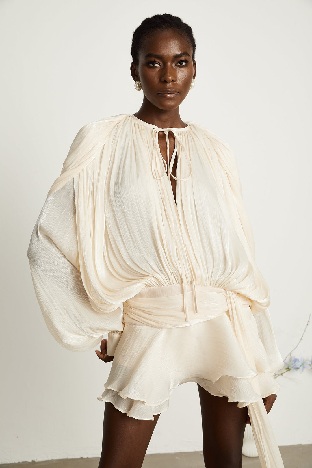 Eugénie fully-pleated ruffled mini dress in Neutrals - Celestia Couture