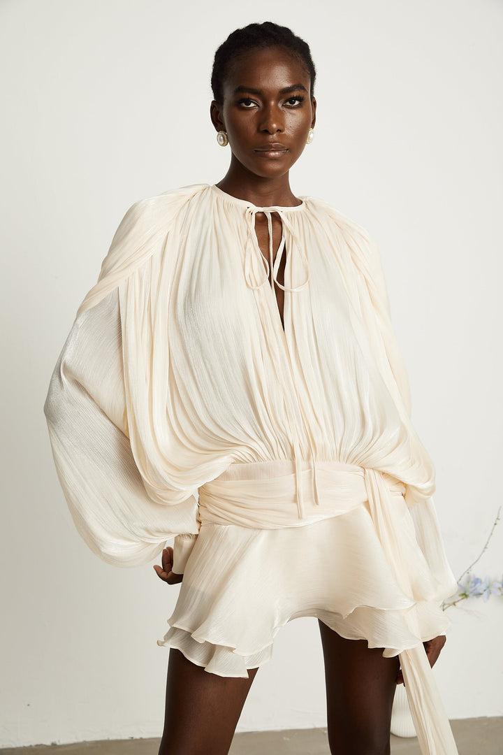 Eugénie fully-pleated ruffled mini dress in Neutrals - Celestia Couture