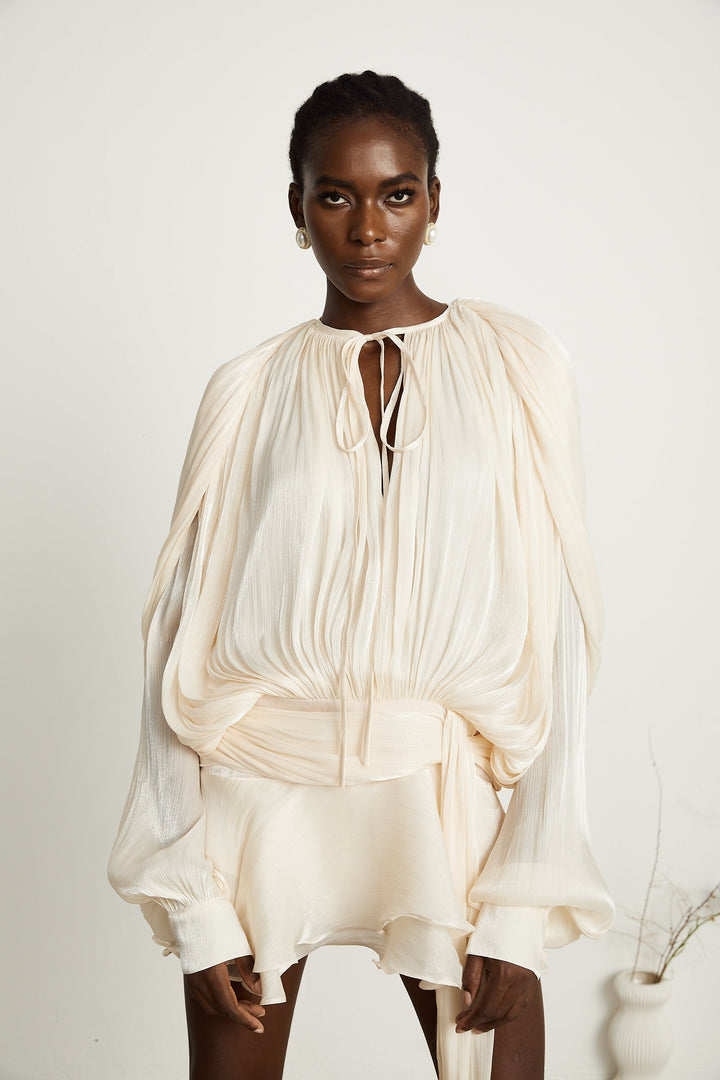 Eugénie fully-pleated ruffled mini dress in Neutrals - Celestia Couture