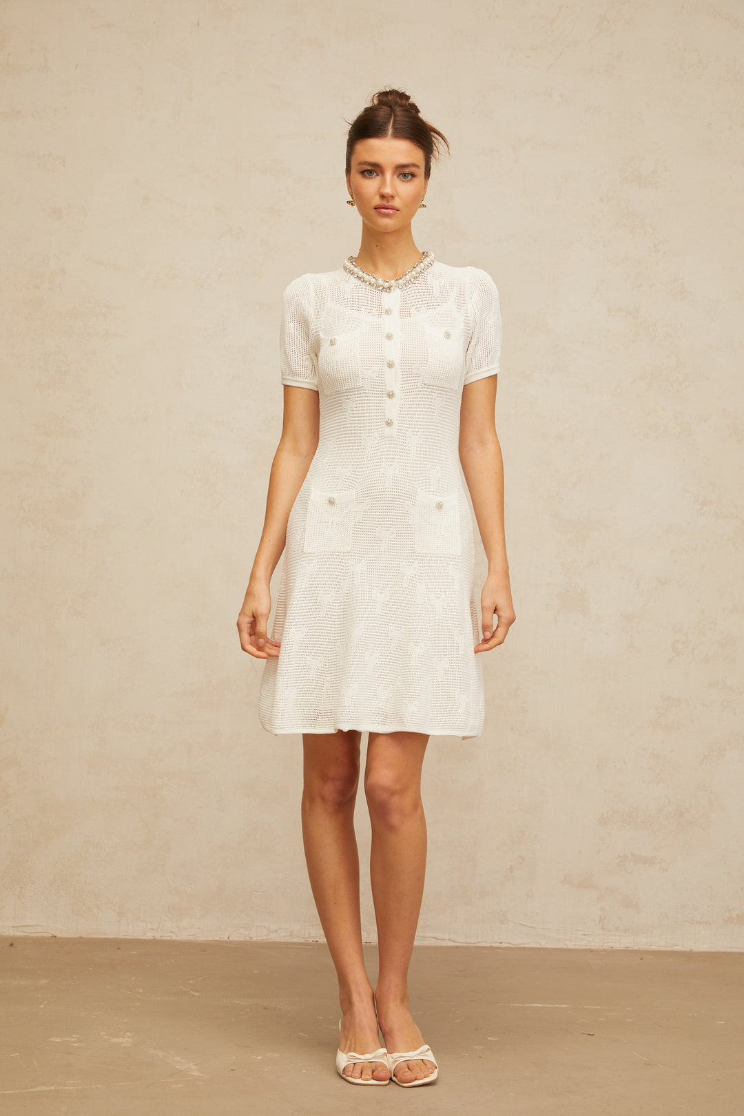 Marjolaine white embellished crochet-knit mini dress - Celestia Couture