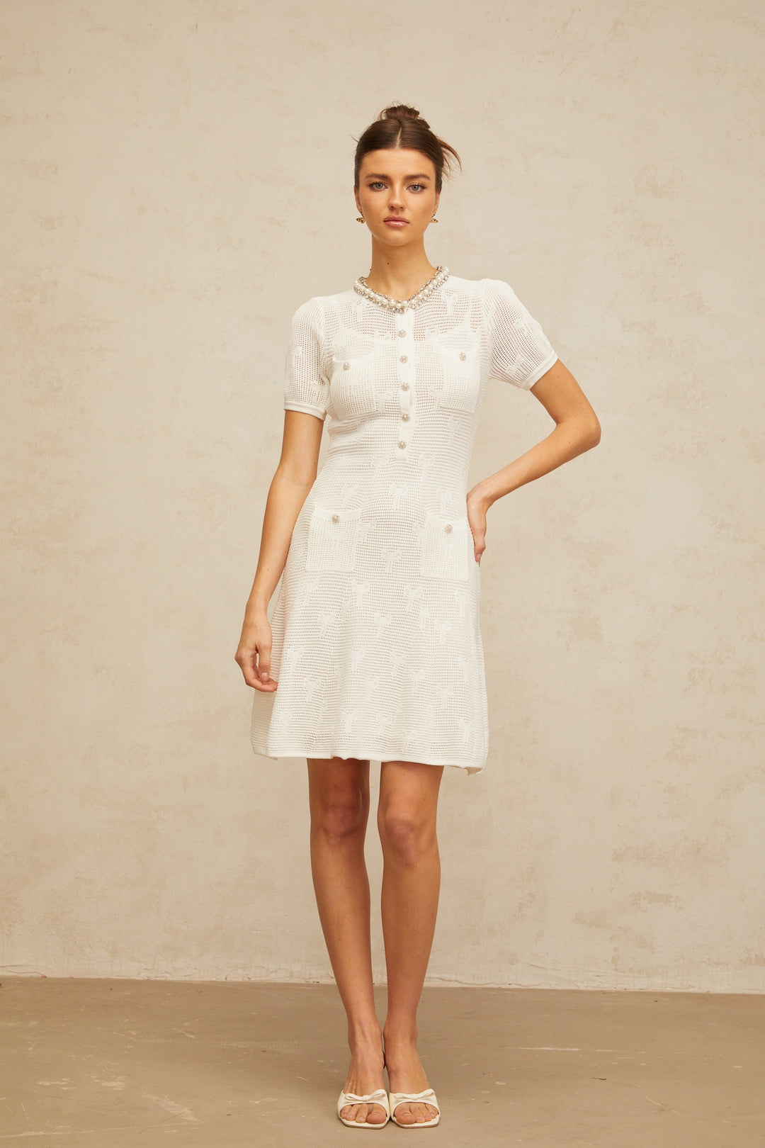 Marjolaine white embellished crochet-knit mini dress - Celestia Couture