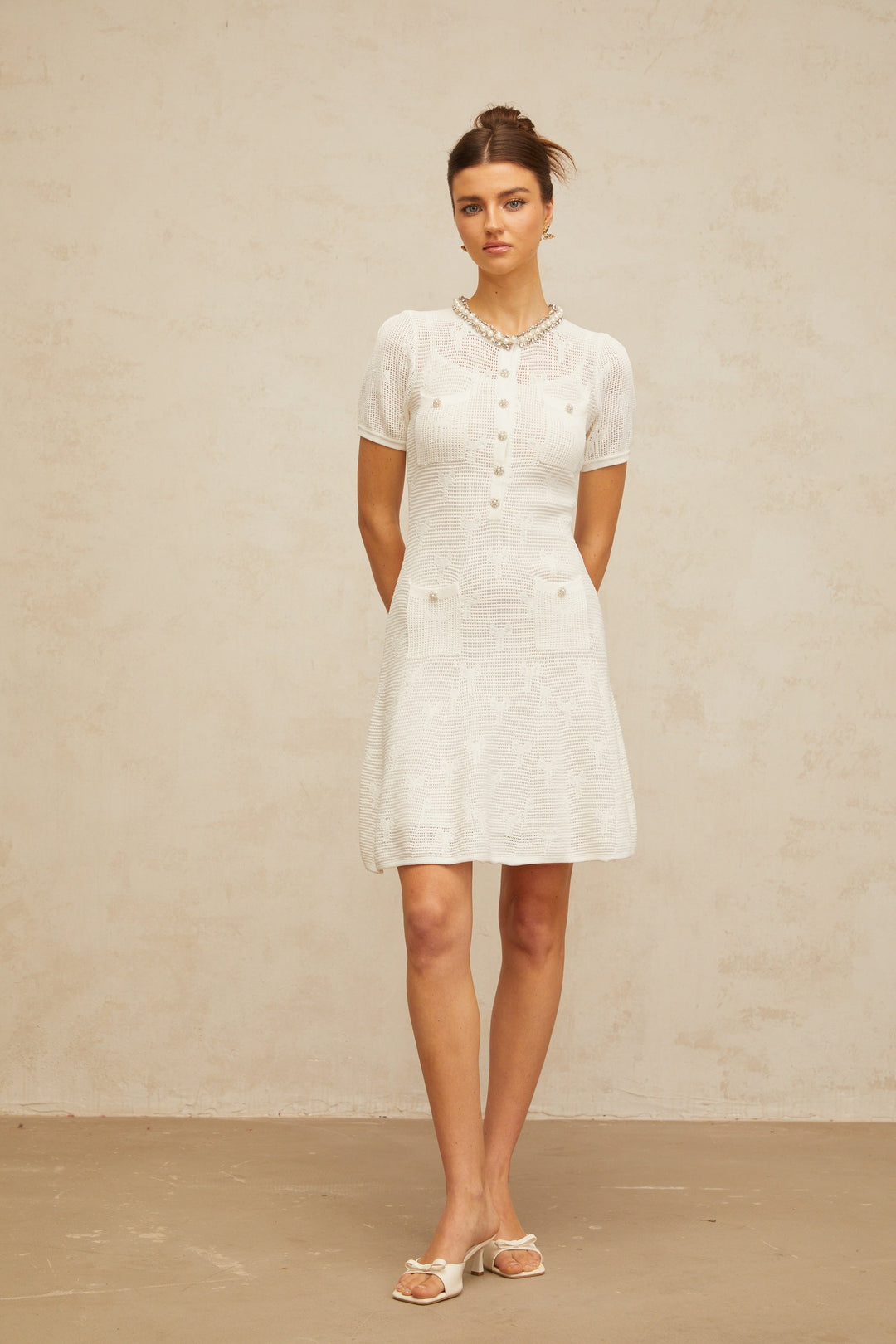 Marjolaine white embellished crochet-knit mini dress - Celestia Couture
