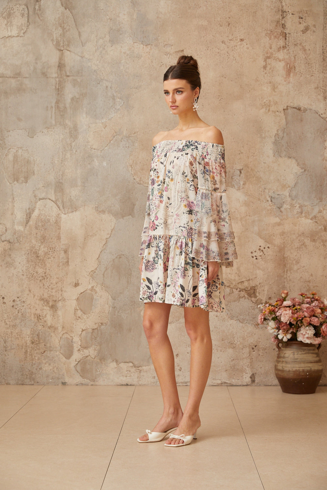 Yasmine smocked floral-print mini dress - Celestia Couture