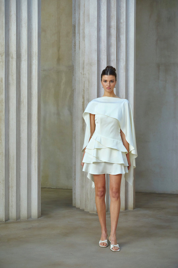 Lyna White Satin Ruffled Mini Dress with Shawl Panel Detail - Celestia Couture