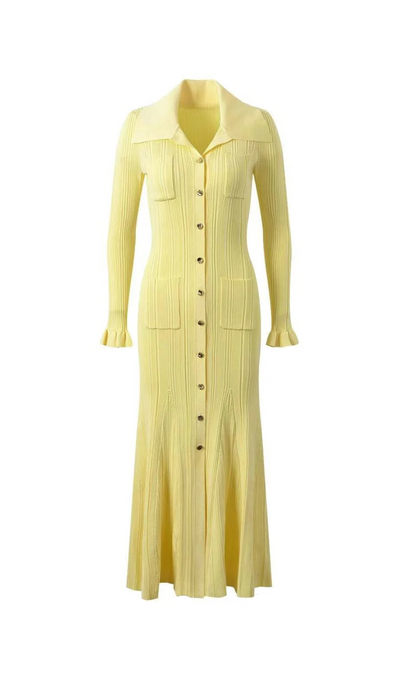 Yellow ribbed dress with buttons on a white background