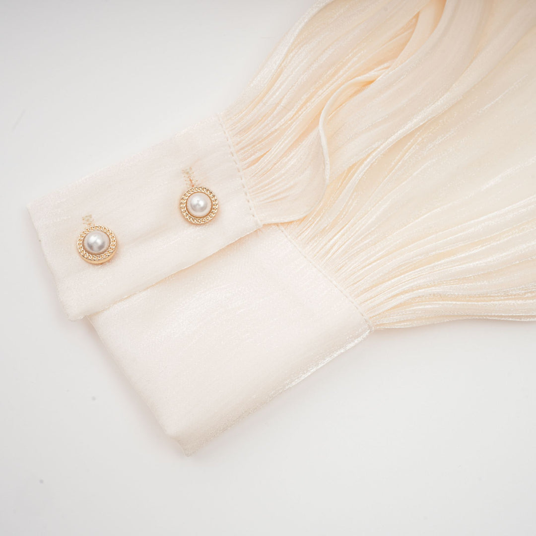 Eugénie fully-pleated ruffled mini dress in Neutrals - Celestia Couture