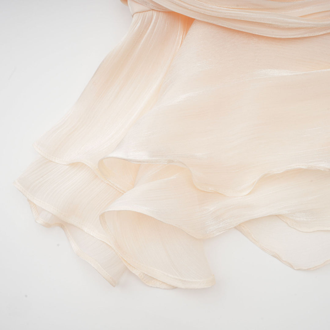 Eugénie fully-pleated ruffled mini dress in Neutrals - Celestia Couture