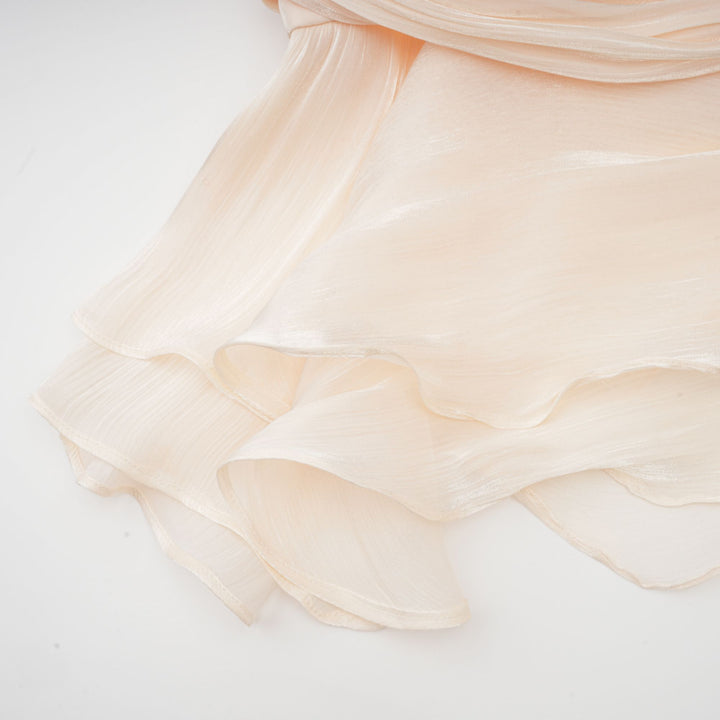 Eugénie fully-pleated ruffled mini dress in Neutrals - Celestia Couture