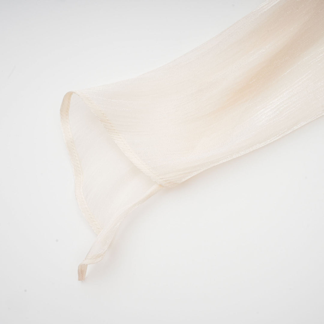 Eugénie fully-pleated ruffled mini dress in Neutrals - Celestia Couture