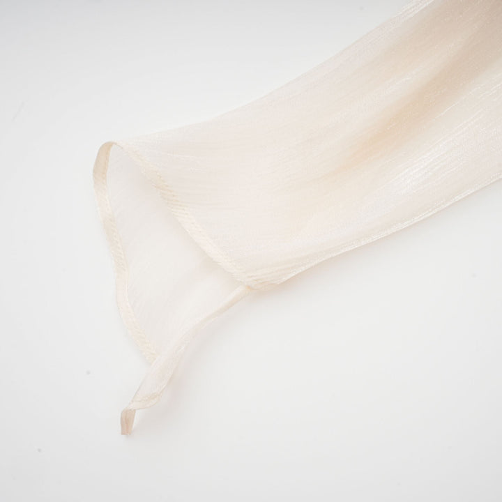 Eugénie fully-pleated ruffled mini dress in Neutrals - Celestia Couture