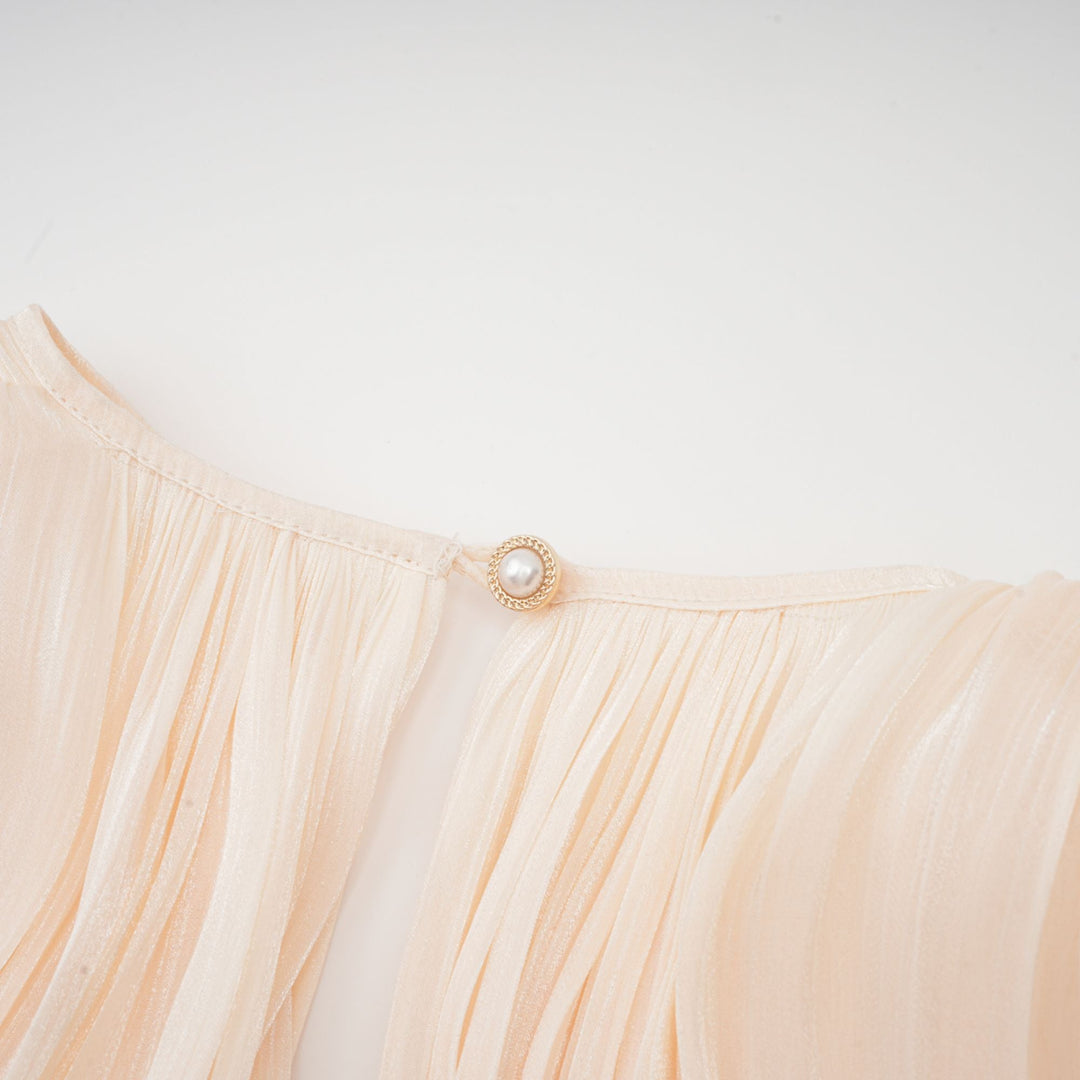 Eugénie fully-pleated ruffled mini dress in Neutrals - Celestia Couture